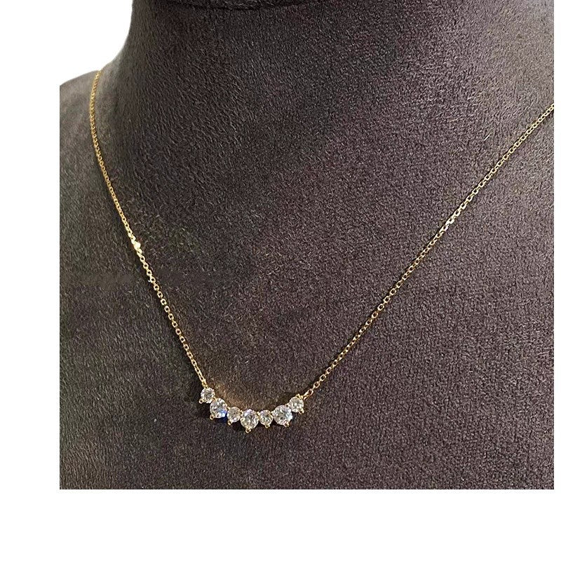 Smile curve necklace worn around the neck