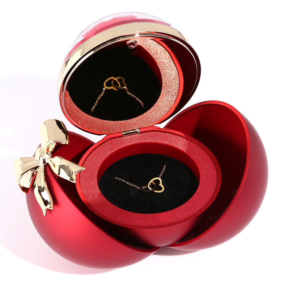 Magnetic heart necklace shown in its gift box